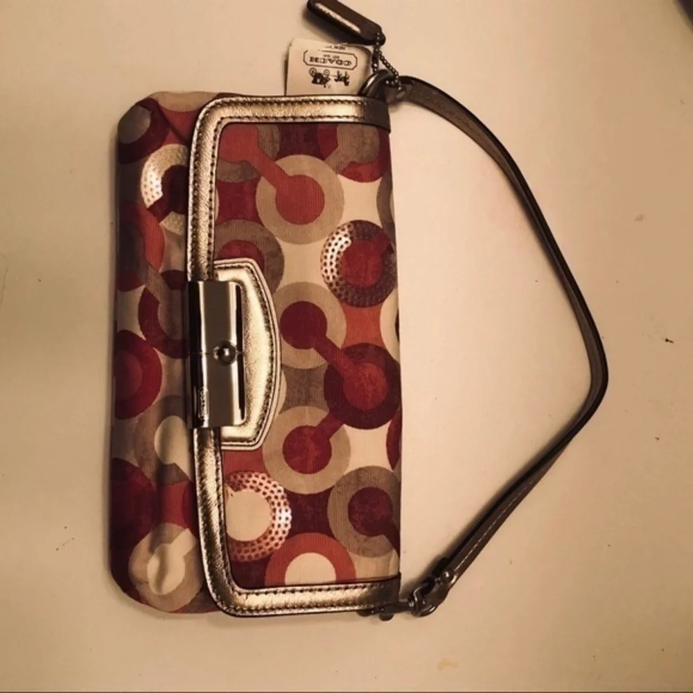 Coach optic c pink metallic wristlet bag clutch